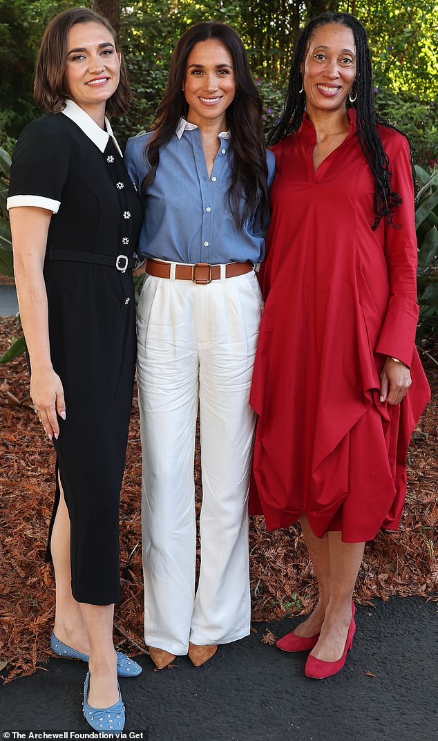 Meghan Markle (pictured, centre) during her visit to Girls Inc. of Greater Santa Barbara (also seen Larissa May, pictured, left; and Dr. Stephanie J. Hull, pictured, right)