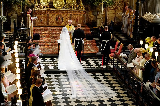 Prince Harry and Meghan Markle in St George's Chapel at Windsor Castle during their wedding service