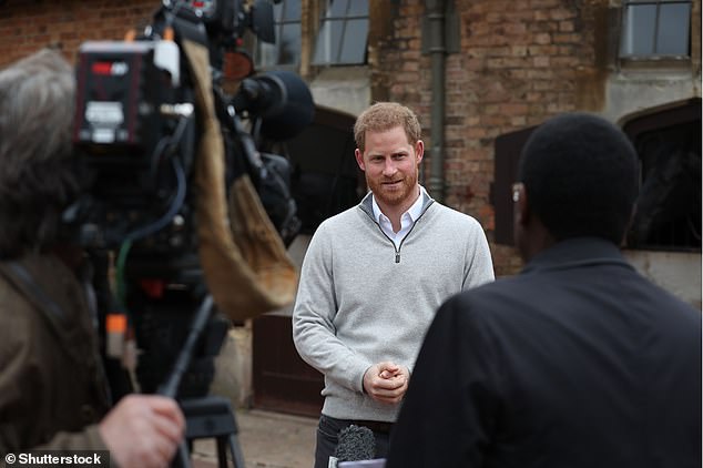 A few hours later, Harry spoke to journalists at Windsor to reveal his son's name