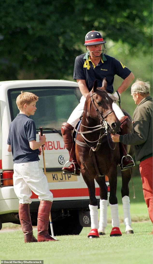 Prince Charles with son Harry at a polo game in Cirencester Park, Gloucestershire, in 1999