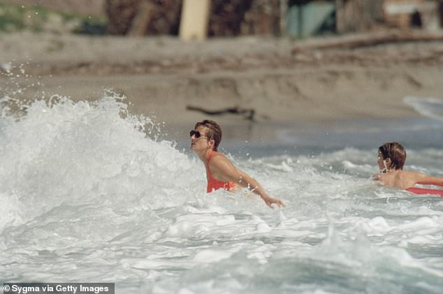 Diana enjoying the sea foam as she holidays with her two sons in January 1993