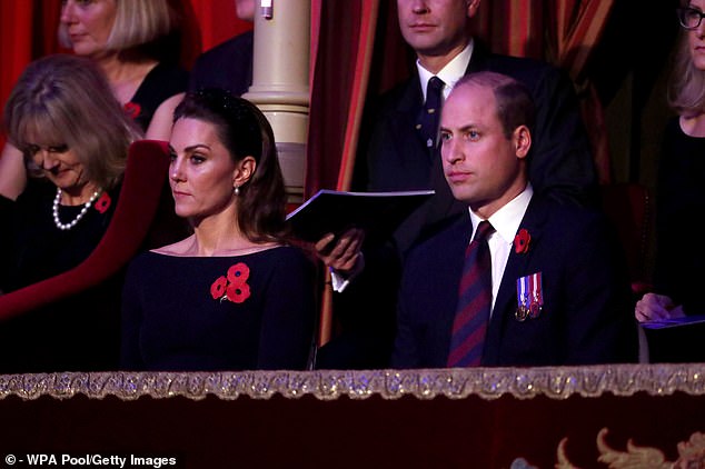 2019: Harry and Meghan sat next to each other, but were not seated alongside William and Catherine (pictured) in the royal box