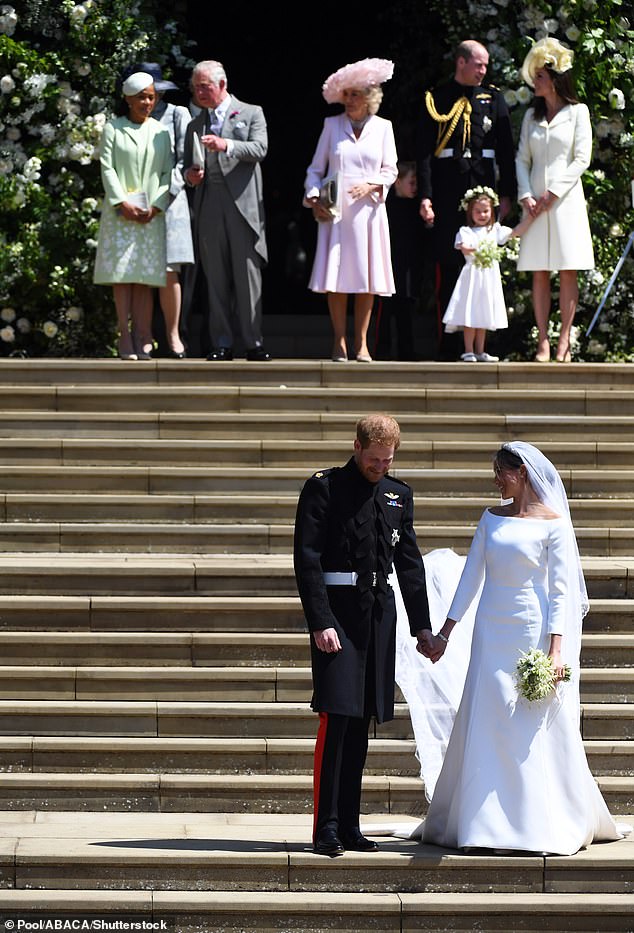 The Royal Family on the steps of St George's Chapel in Windsor after Prince Harry married Meghan