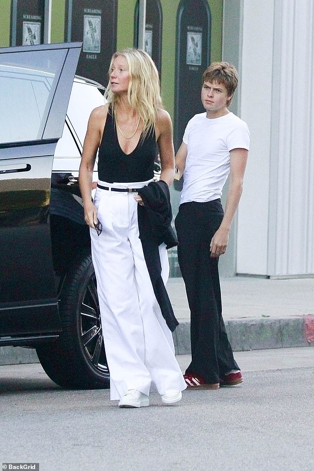 Gwyneth Paltrow arriving at a restaurant with her son, Moses Martin, in August 2023