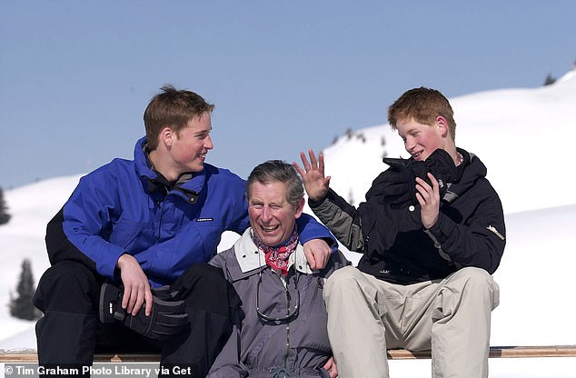 Prince William shares a joke with his father and  his brother during a photocall on the ski slopes in Klosters