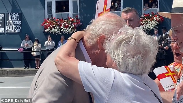 During the King's trip to the Channel Islands in July, one mischievous 91-year-old local, Kathleen Moriarty, planted a kiss on the monarch's cheek, much to the delight of onlookers