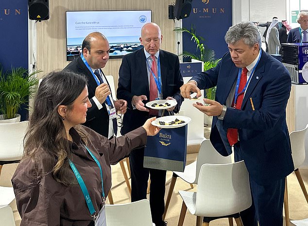 Attendees at the climate summit can be seen enjoying caviar