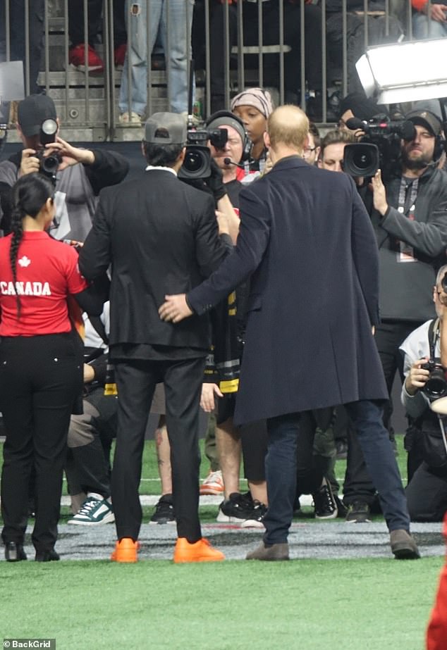 Prince Harry posed for photos as he made a surprise appearance without Meghan in Vancouver