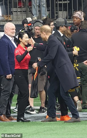 The Duke of Sussex was seen embracing Team Canada Invictus Games athlete Wenshuang Nie