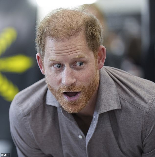 The Duke of Sussex reacts while talking with students from Shaughnessy Elementary School during the Invictus Games School Programme launch