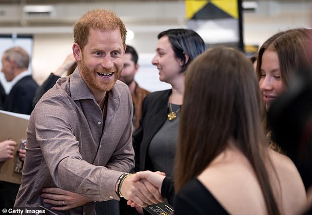 Harry meets with high school students during the School Programme launch event