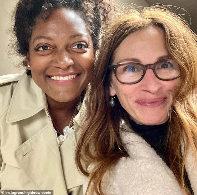 The hairdresser, who runs the salon 'Highbrow Hippie' in Venice, California, has often posted about colouring Meghan's hair. Her other clients include Oscar-winning actress Julia Roberts (pictured right)