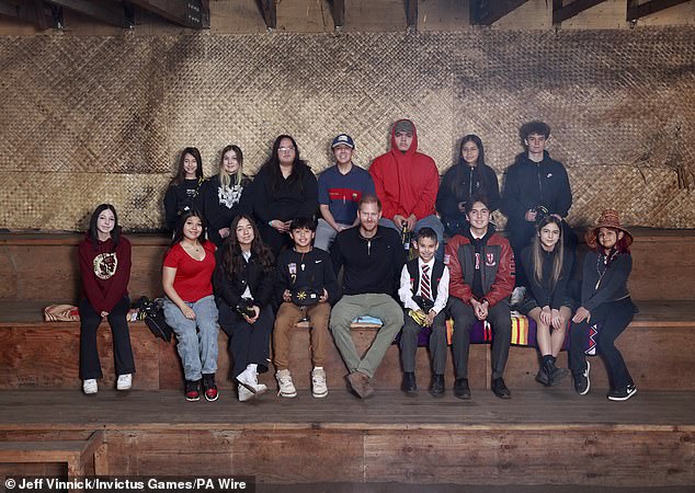 Prince Harry has met with a group of young people in Canada as part of the build-up to the Invictus Games in Vancouver (pictured with a group of young people from all Four Host First Nations)