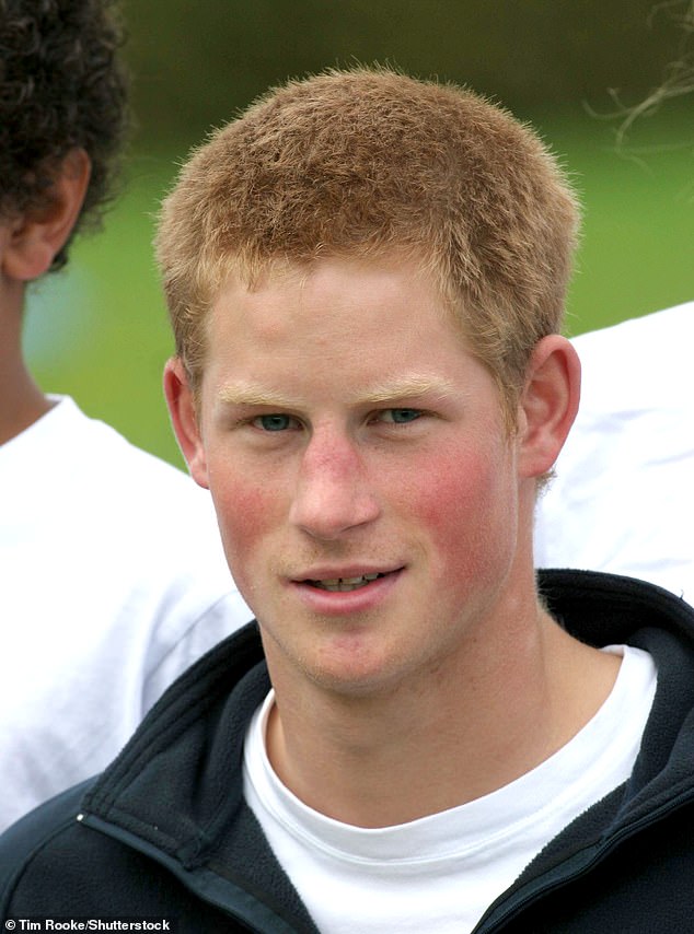 The Prince, with short hair, pictured working as an assistant development officer with the Rugby Football Union at a primary school in 2004