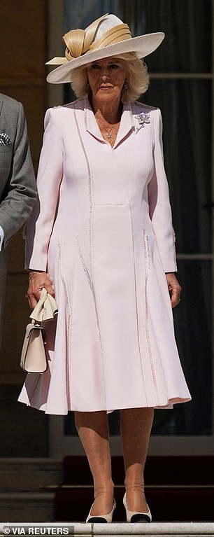 For a Buckingham Palace garden party in May, Camilla wore an Anna Valentine pale pink coat dress with Chanel pumps