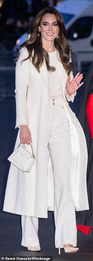 Kate captivated onlookers in an all-white ensemble at the Christmas carol concert