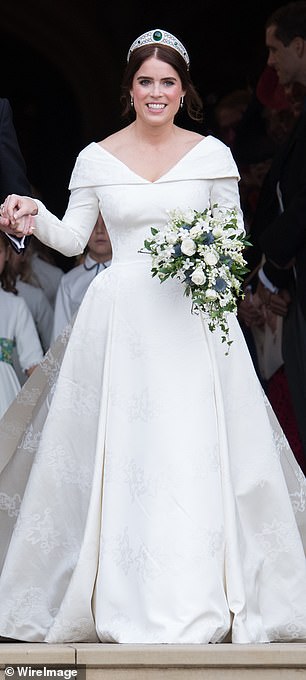 Eugenie's wedding dress featured a low back to highlight a long scar from a procedure that Eugenie had to correct scoliosis - curvature of the spine - when she was 12 years old