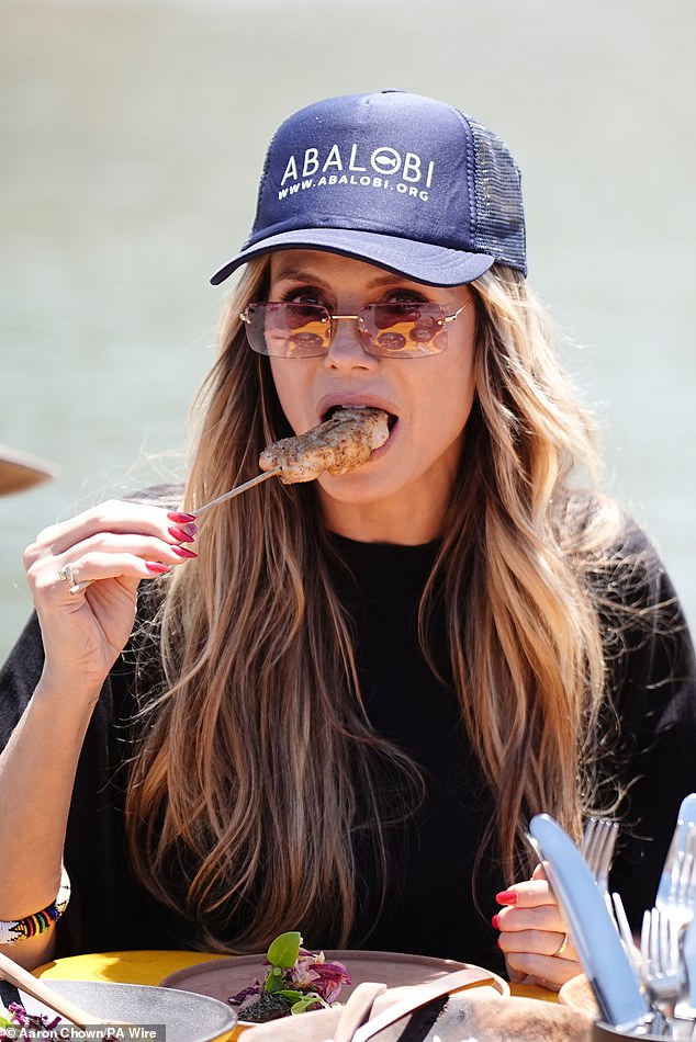 Supermodel Klum tucked into what looked like a delicious lunch on the harbour