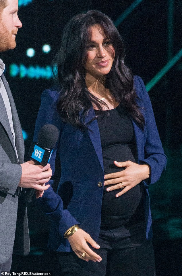 The Duchess of Sussex is seen wearing the pricy garment during an engagement in London in March 2019