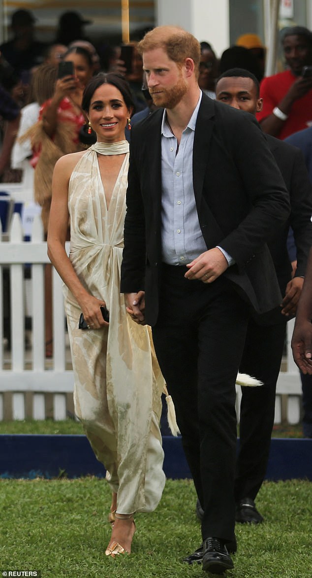 Pictured: Prince Harry and Meghan attend a polo fundraiser event in Lagos, Nigeria in May 2024