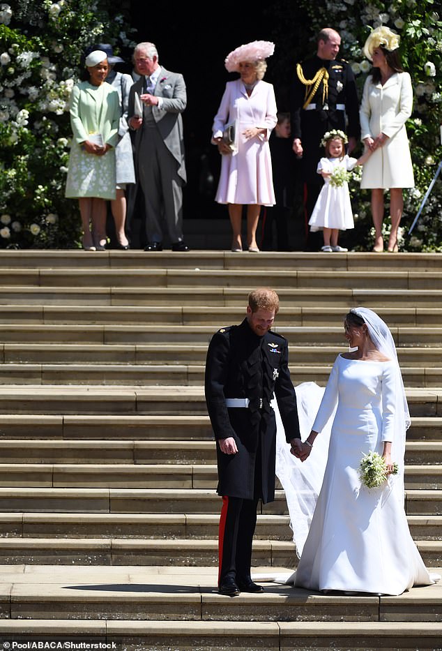 The Royal Family on the steps of St George's Chapel in Windsor after Prince Harry married Meghan