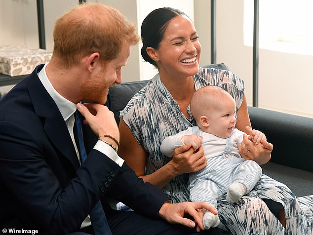 Prince Harry, Duke of Sussex, Meghan, Duchess of Sussex, with Archie in September 2019