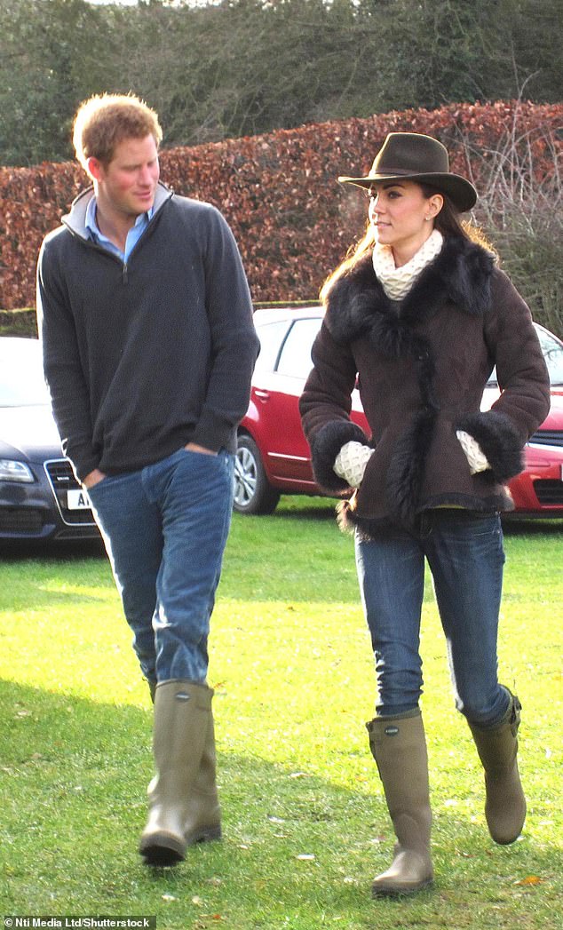 Harry and Kate in matching Le Chameau Vierzon Wellington boots at a football match near Sandringham on Christmas Eve in 2011