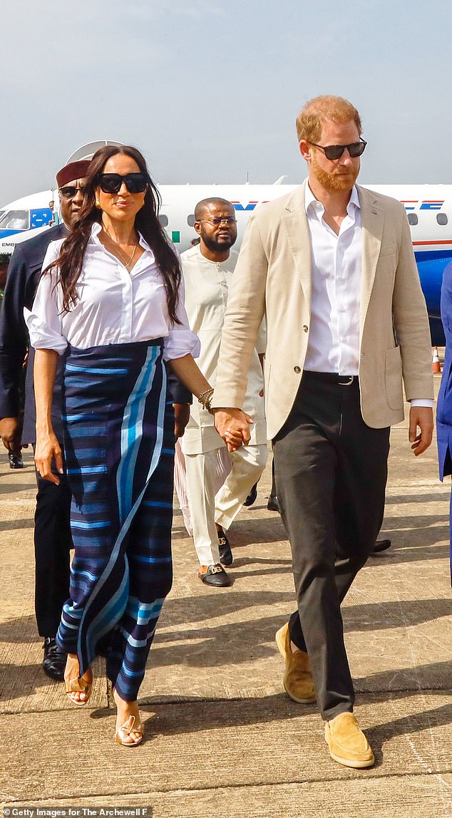 Harry and Meghan Markle arriving in Nigeria in May, the Prince in Loro Piana loafers and jacket