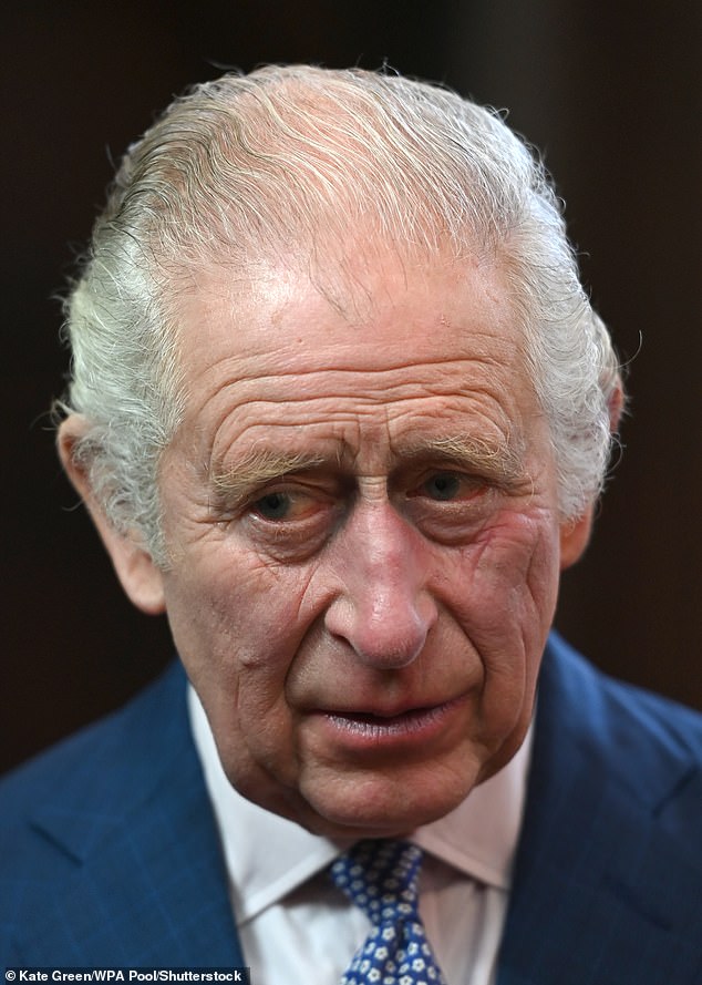 Charles, wearing his thinning hair in a combover fashion, visiting Gray's Inn in 2022