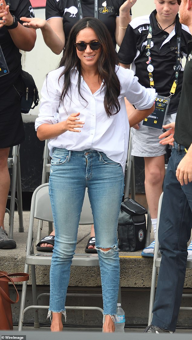 Although Meghan had only just been introduced to the world's media and wasn't even engaged, her appearance in Toronto at The Invictus Games wearing ripped jeans and a white 'husband' shirt must have sounded alarm bells at the Palace