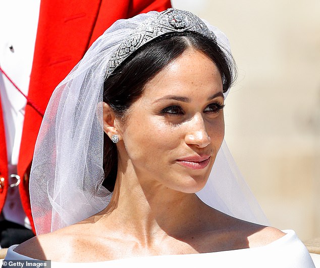 Meghan's tiara was on loan from the Queen, who had chosen one which Meghan could wear for her big day