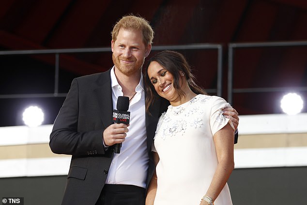 Prince Harry seen hugging his wife as they speak on stage at the Global Citizen Live event in new York, September 2021