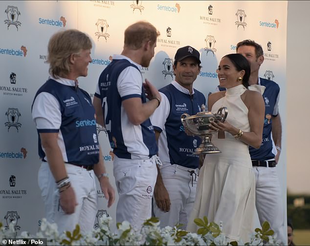 In the documentary, Meghan presents Harry with a trophy - but this minor appearance was one that has been seen before