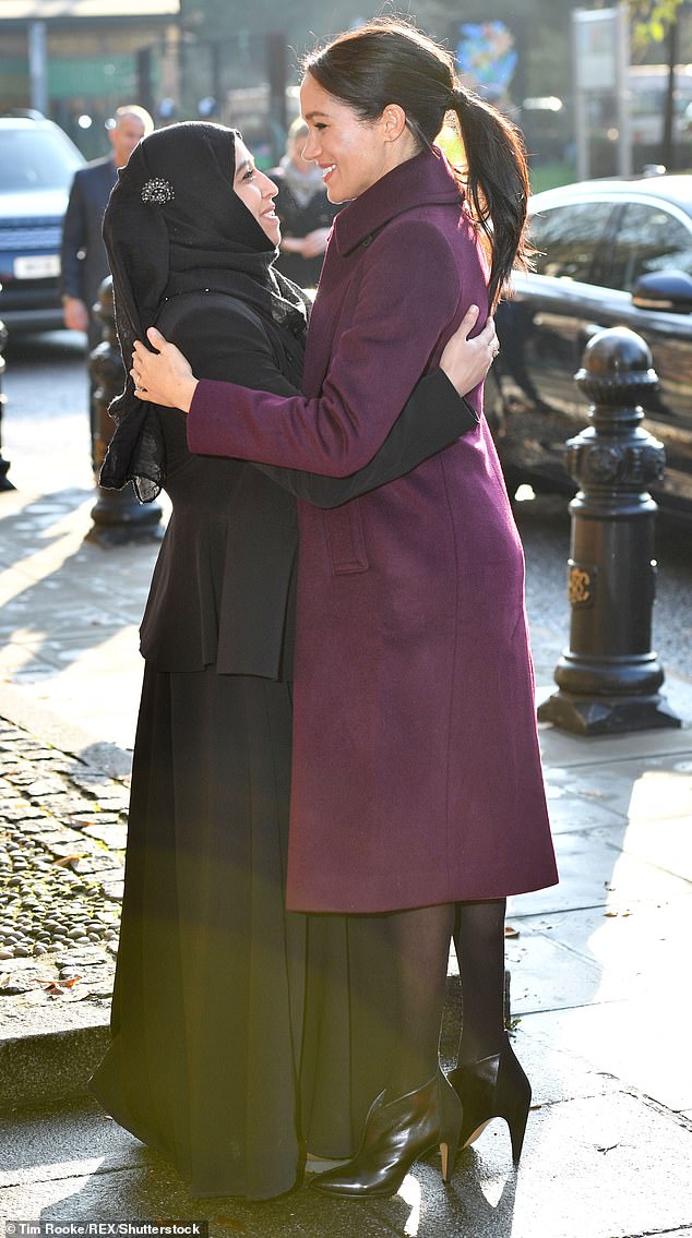 Meghan Markle was praised on American broadcast network CBS over the weekend for being a 'big hugger' - a characteristic she has repeatedly demonstrated, including during a 2018 visit to the Hubb Community Kitchen in  London (pictured)