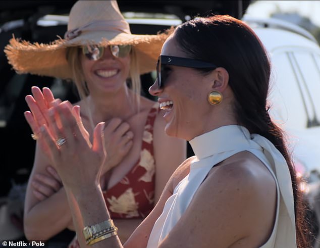 The Duchess cheers for her husband after he scores a goal