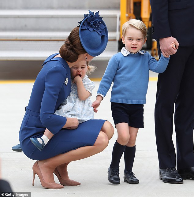 Kate was also pictured crouching down to a much younger Prince George and Princess Charlotte at Victoria Airport in 2016