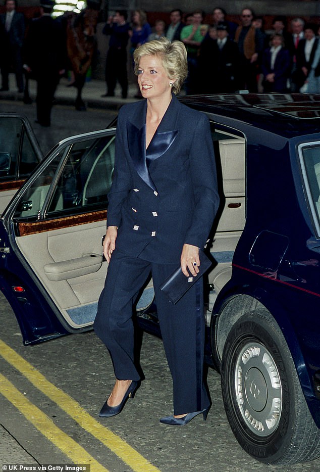 Stepping out in a midnight blue two-piece for a Phil Collins concert at the Royal Albert Hall in 1990, Diana was a vision in this monochrome ensemble by Irish designer Paul Costelloe. It was recycled over the next four years, either with the matching tuxedo trousers or a lace skirt