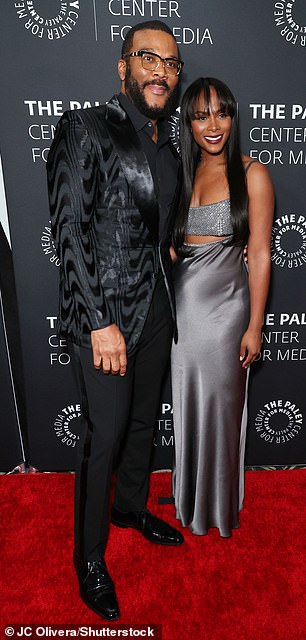 While on the red carpet he posed with actress Tika Sumpter, 44, who thrilled in a silver gown