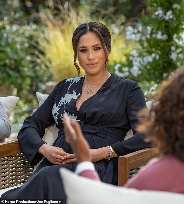 Meghan, pictured in a 2021 interview with Oprah Winfrey, has been labelled 'Duchess Difficult' after media reports claimed the 'dictator in high heels' reduced grown men to tears due to her 'barking' of orders, leading to a slew of resignations - although she denies the allegations