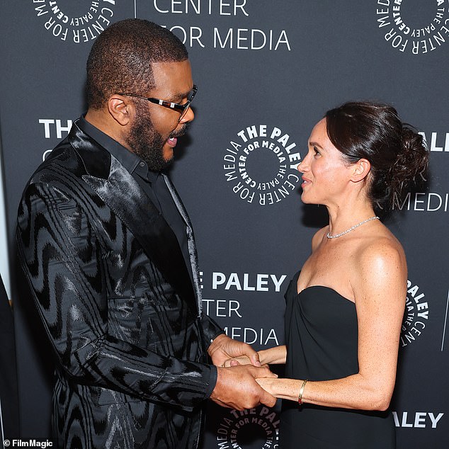 Tyler Perry and Meghan Markle in conversation at the Beverly Wilshire Hotel in Beverly Hills yesterday