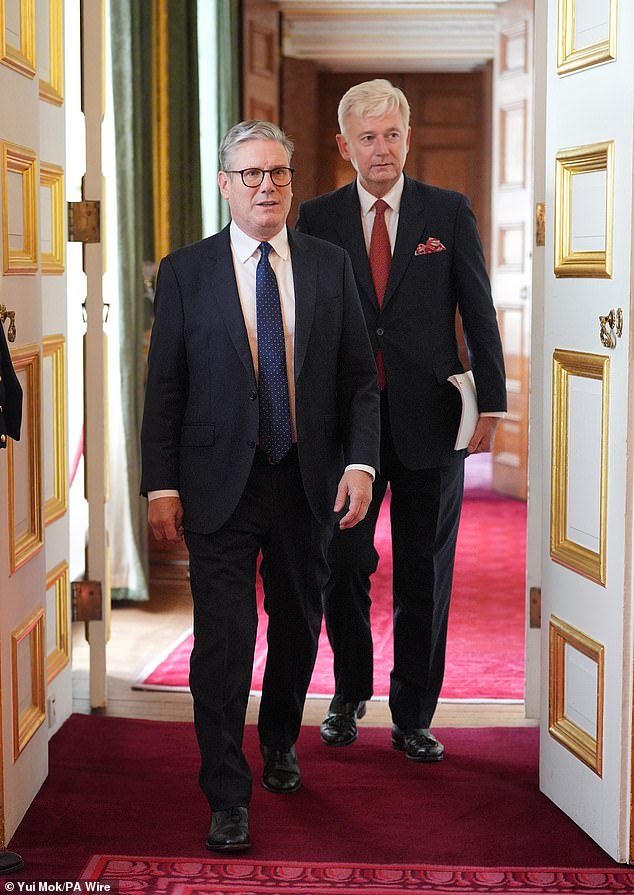 Sir Keir Starmer and Sir Clive Alderton at an event for The King's Trust to discuss youth opportunity, at St James's Palace in central London on July 12, 2024