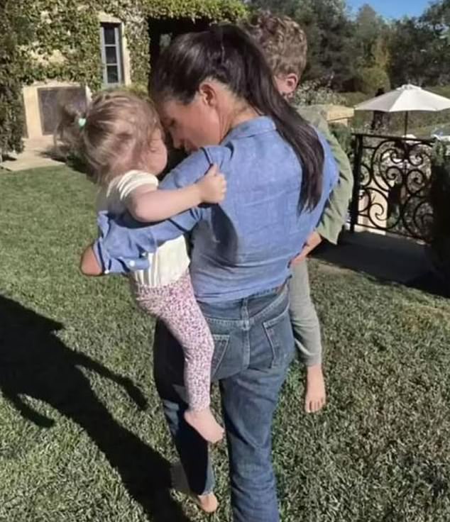 Meghan Markle seen with Archie and Lilibet in the garden of the family's Montecito home in California. The Duchess said of her children's Thanksgiving experiences: 'We¿re at the age where I just can¿t wait to see it through their lens every year'