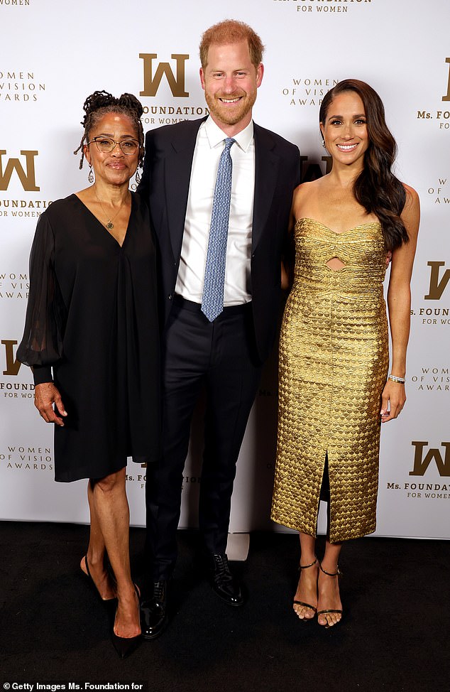 Prince Harry and Meghan with Doria Ragland at an awards ceremony in 2023