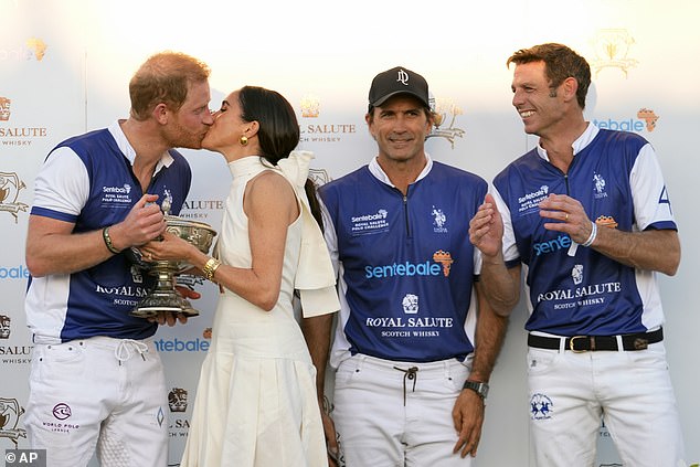 The royal couple kiss after Prince Harry's team won the Royal Salute Polo Challenge