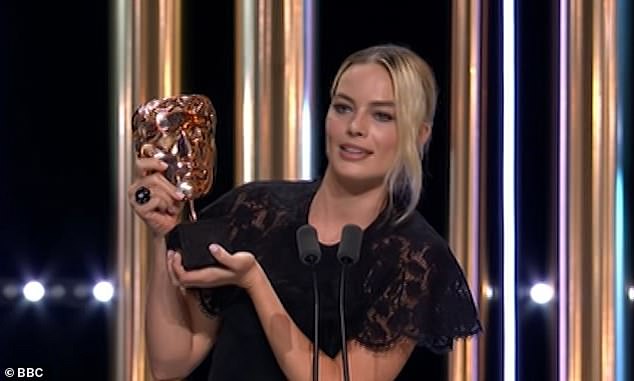 Margot repeated Jim's joke in the speech saying Brad planned to call the award Harry because he was looking forward 'to taking it back to America'.