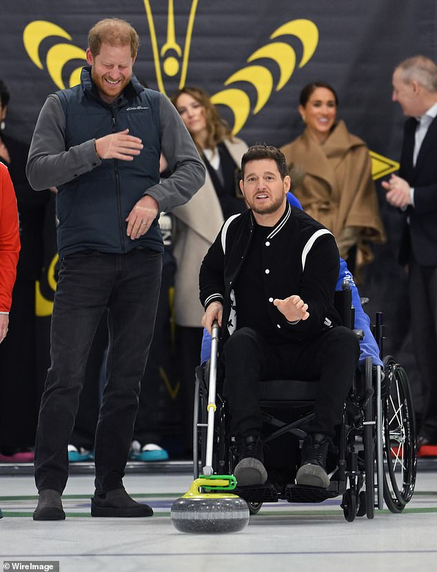 Prince Harry pictured with singer Michael Buble at an Invictus Games event this year