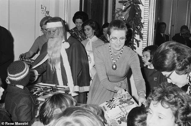 Princess Grace of Monaco giving out presents to children back in 1973