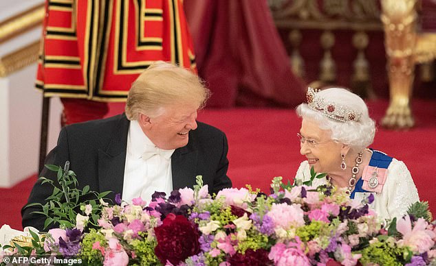 Donald Trump sits with Queen Elizabeth at the State Banquet at Buckingham Palace in London on June 3, 2019