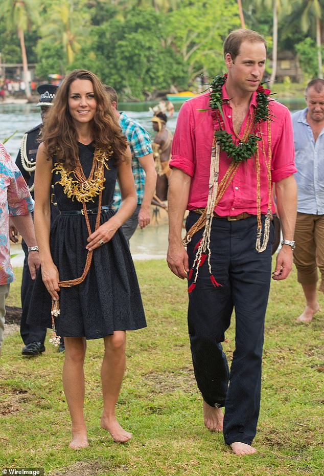 Princess Kate going barefoot with Prince William during a visit to Tavanipupu Island in 2012