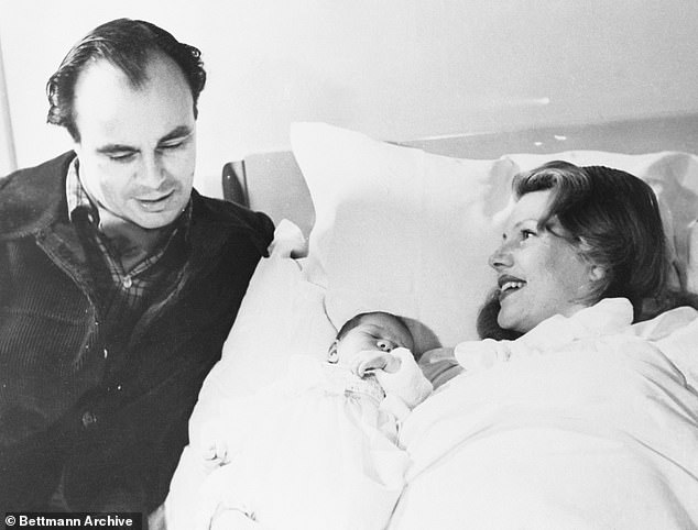 Prince Aly Khan and actress Rita Hayworth pose with their 4-day-old daughter who sleeps unconcerned as the first pictures of the family are snapped. Princess Yasmine was born on December 28 at the exclusive Montchoise Clinic in Lausanne